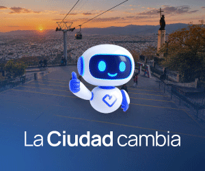 Un robot animado con pulgar hacia arriba frente a un paisaje urbano al atardecer, con el texto 'La Ciudad cambia' debajo.
